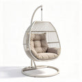 Hangstoel van staal en rotan met kussens in beige 80 x 60 x 120cm